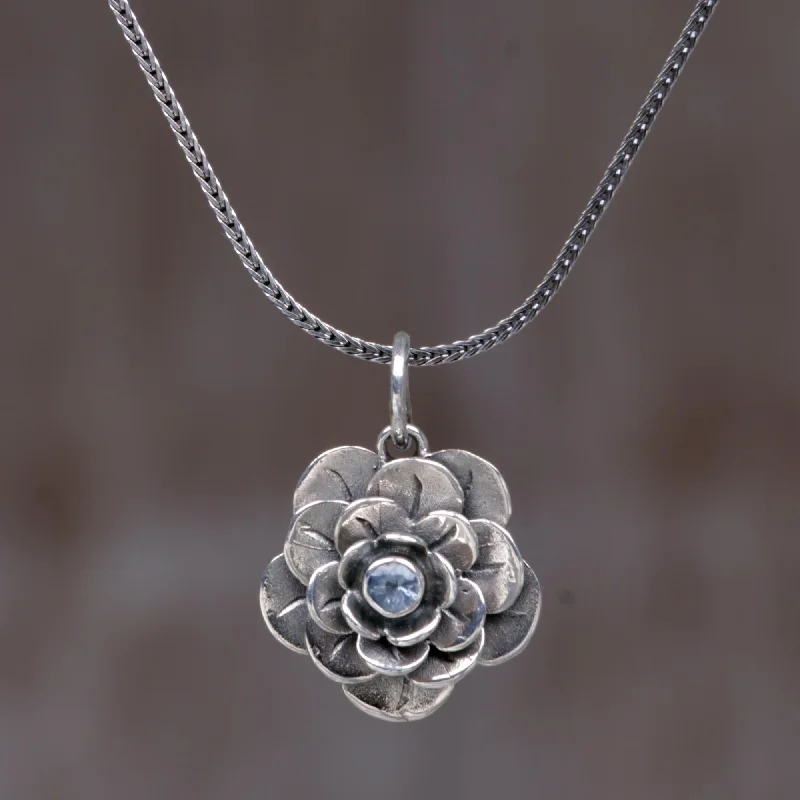 ---Holy Lotus Handcrafted Floral Silver and Blue Topaz Necklace