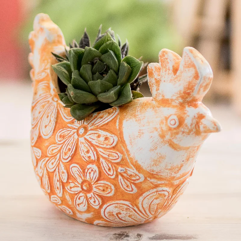 - Teething and chewing toys for puppiesRoosting Ginger Hen Handcrafted Ceramic Orange Hen Flower Pot from El Salvador