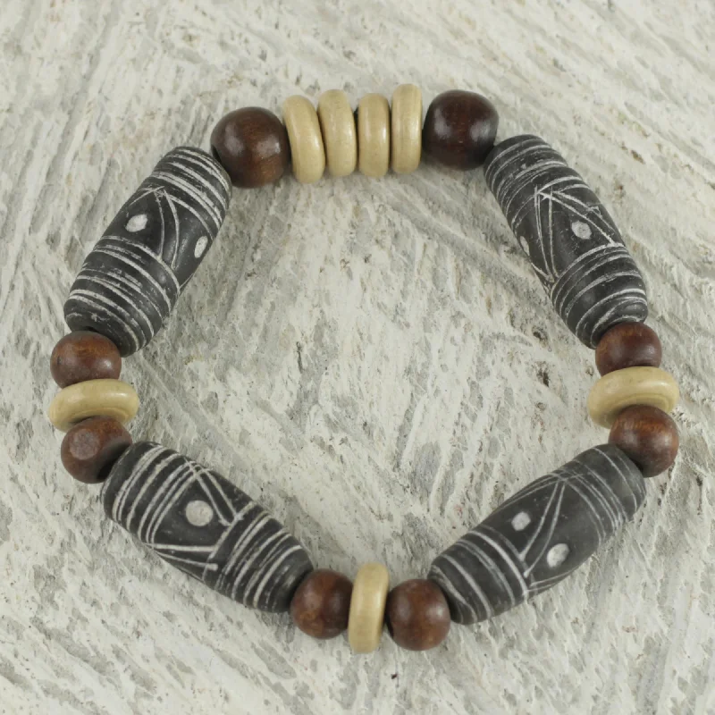 - Air box TSA certified check-inAfrican Woman Brown Earth Tone Beaded Stretch Bracelet by Ghana Artisan